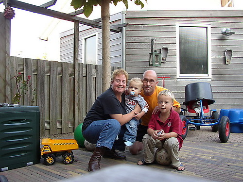 Sandra met haar man en twee kinderen